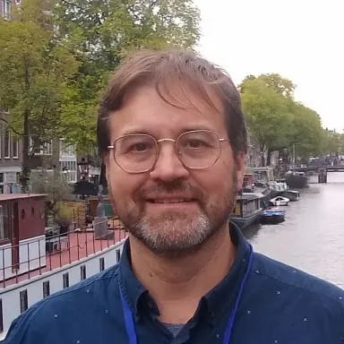 Headshot of Chet Bailey, founder of Unswivel